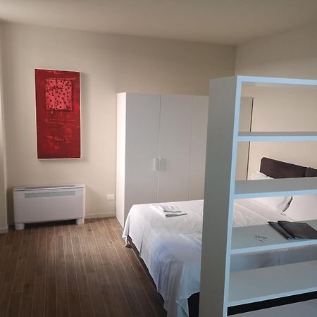 Suiten Apartments Bolonia Habitación foto