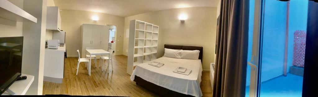 Suiten Apartments Bolonia Habitación foto
